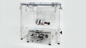 Rigid container inside a CDV chamber equipped with a semi-automatic control system during leak testing