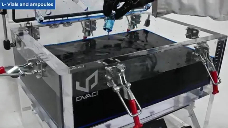 Vial undergoing dye immersion leak testing in a DVACI vacuum chamber